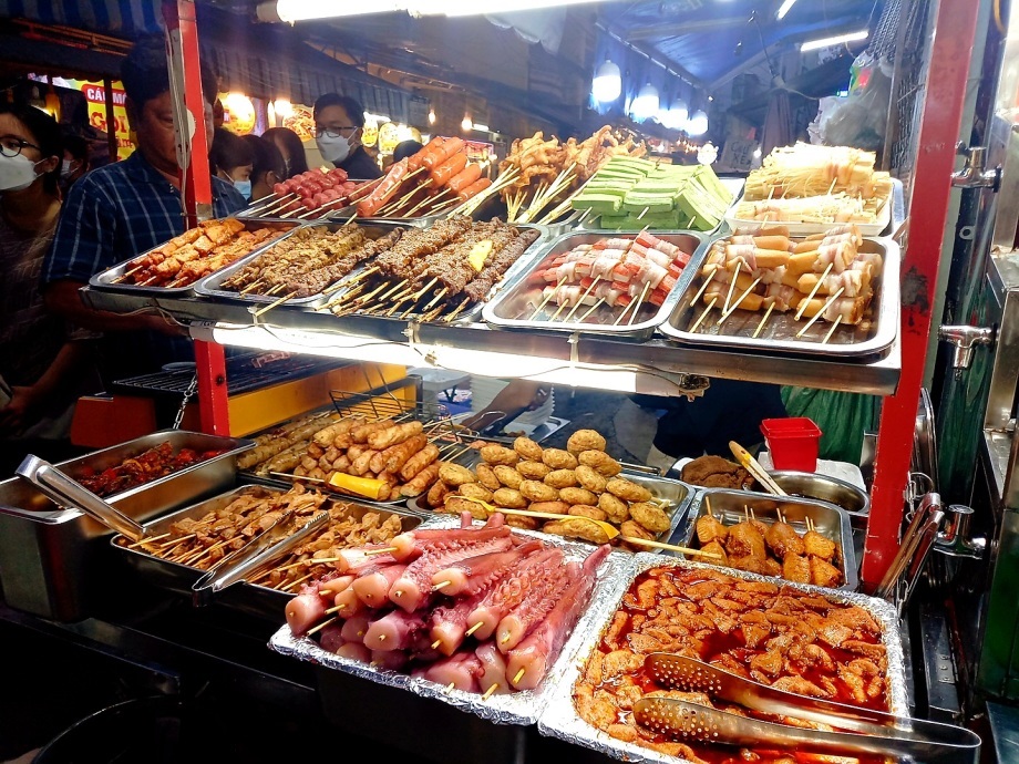 Street Food Tour by Scooter with Local Chef